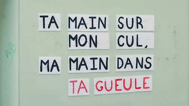 Pancarte riposte féministe ta main sur mon cul ma main dans ta gueule