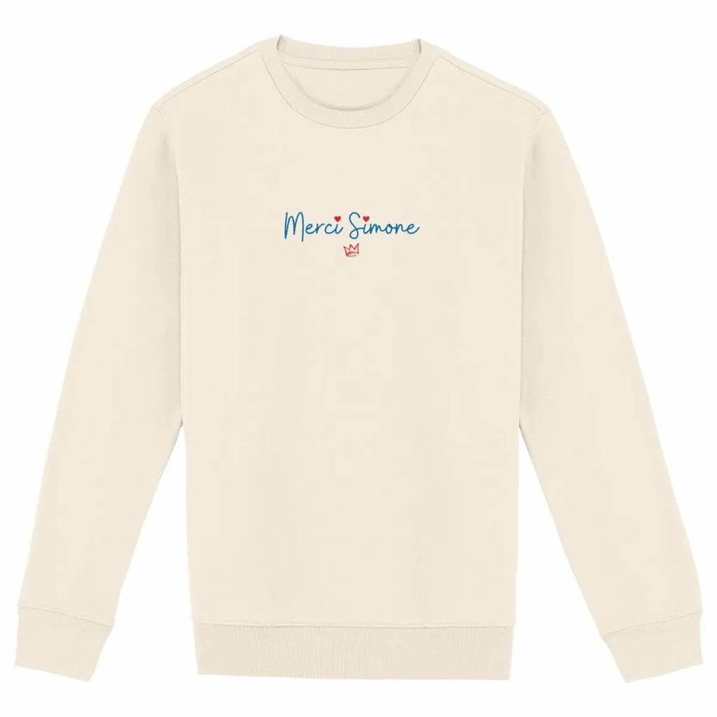 Le sweat-shirt féministe « Merci Simone » ivoire rend hommage à Simone Veil, figure majeure du féminisme français et de la défense des droits des femmes.